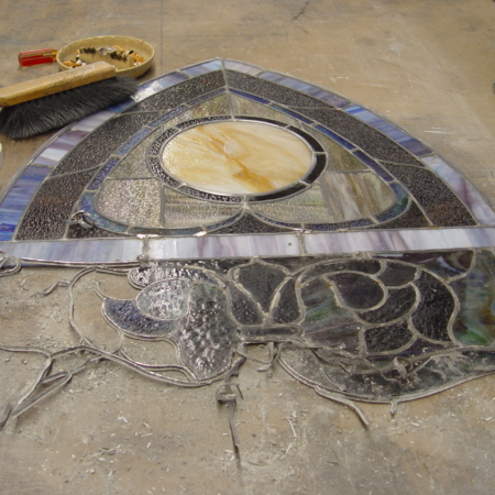 Stained glass dismantled for restoration