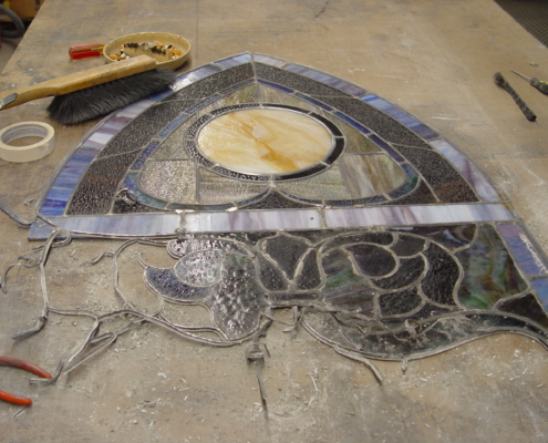 Stained glass dismantled for restoration